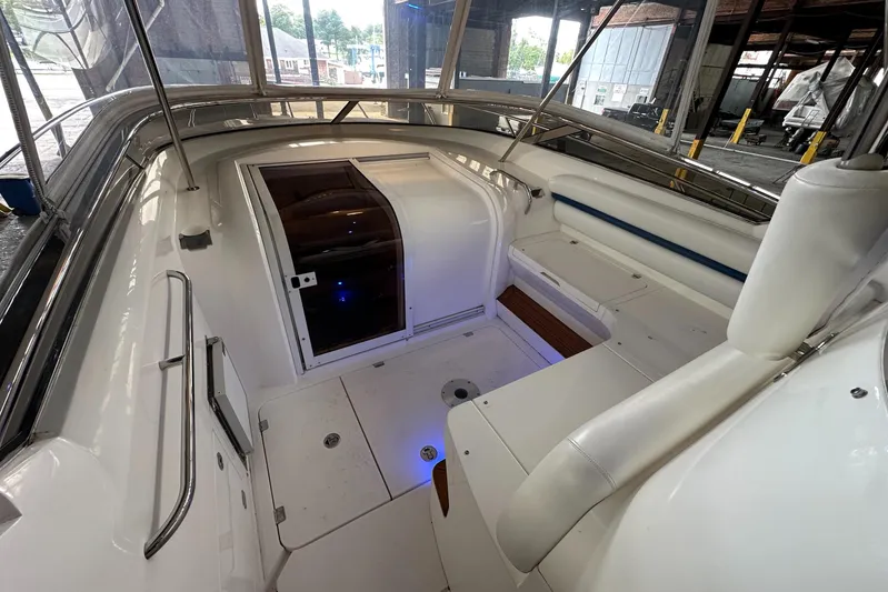  Yacht Photos Pics 2006 Sunseeker Sportfisher 37 interior with white seating and sleek design.