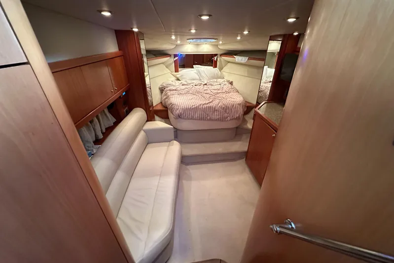  Yacht Photos Pics Interior of 2006 Sunseeker Sportfisher 37 yacht with cozy bed and seating area.