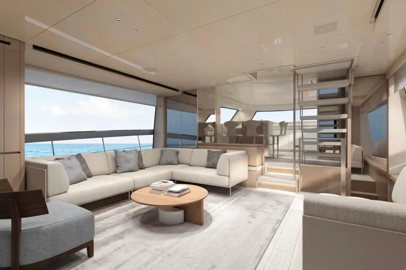  Yacht Photos Pics Luxurious interior of 2026 Sanlorenzo SX76 yacht with modern furnishings and ocean view.