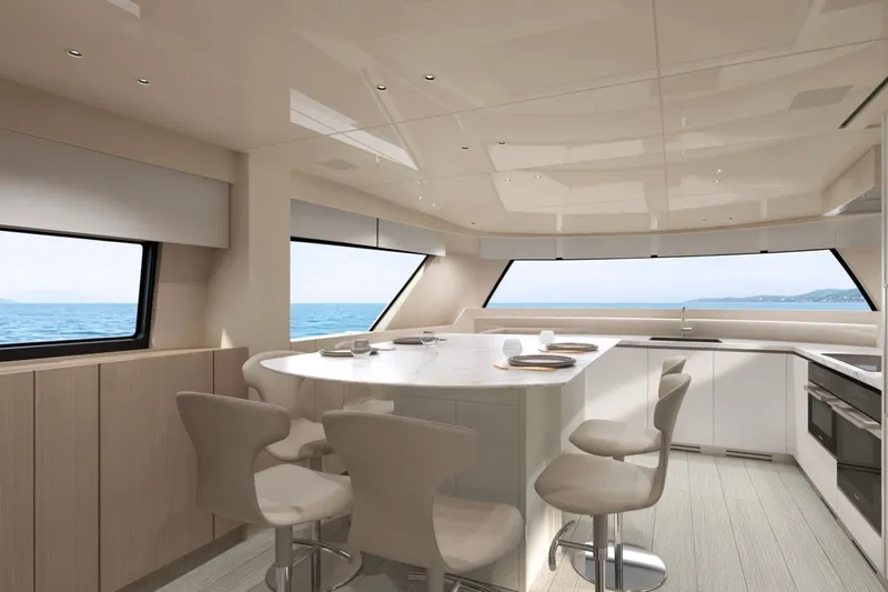  Yacht Photos Pics Luxurious interior of 2026 Sanlorenzo SX76 yacht with modern kitchen and ocean view.