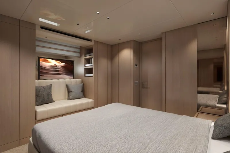  Yacht Photos Pics Luxurious interior of 2026 Sanlorenzo SX76 yacht bedroom with modern design and cozy seating.