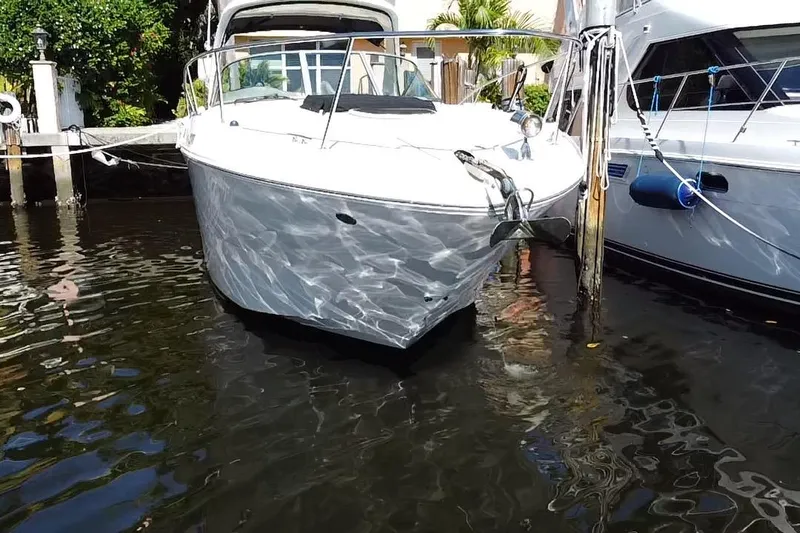  Yacht Photos Pics 2012 Sea Ray 330 Sundancer yacht docked in sunny marina.