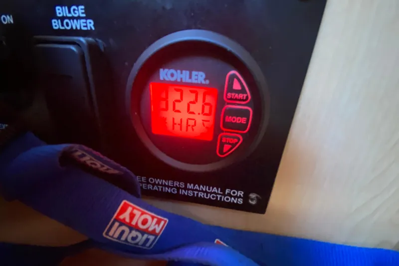  Yacht Photos Pics Kohler generator display showing 322.6 hours on a 2012 Sea Ray 330 Sundancer boat.