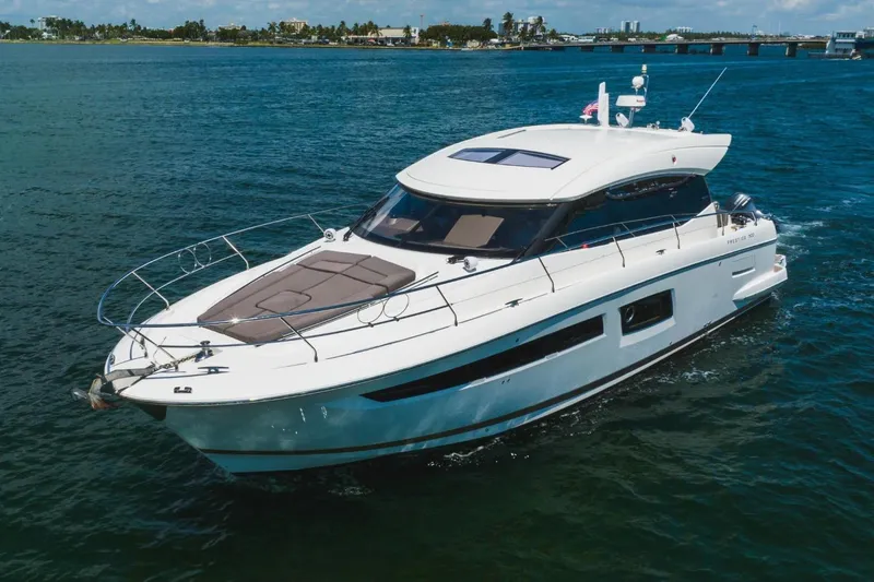  Yacht Photos Pics 2018 Prestige 500S yacht cruising on open water, showcasing sleek design and luxury features.