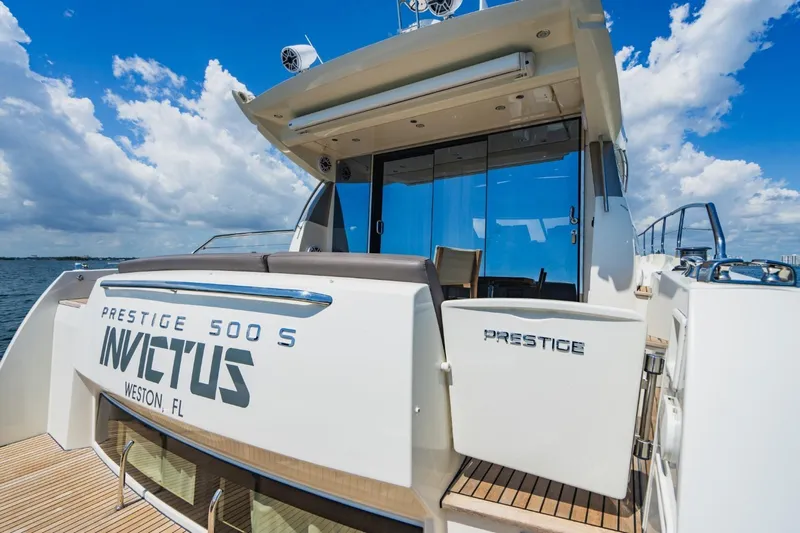  Yacht Photos Pics 2018 Prestige 500S yacht "Invictus" docked, featuring sleek design and luxurious amenities.