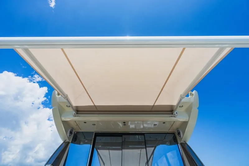  Yacht Photos Pics 2018 Prestige 500S yacht sunshade under clear blue sky.