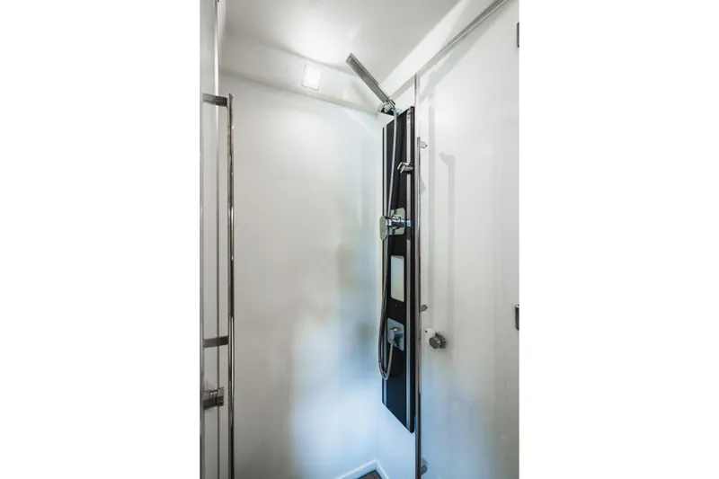  Yacht Photos Pics Modern shower in 2018 Prestige 500S yacht, featuring sleek design and chrome fixtures.