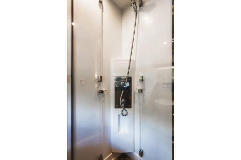  Yacht Photos Pics Shower area inside 2018 Prestige 500S yacht, featuring sleek modern design.