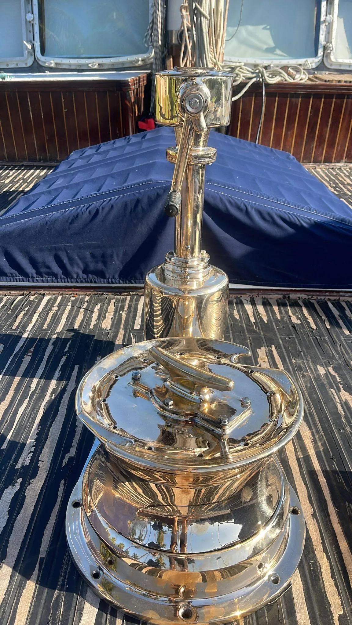 Polished brass winch on 1991 Custom Horacio Carabelli Schooner deck.