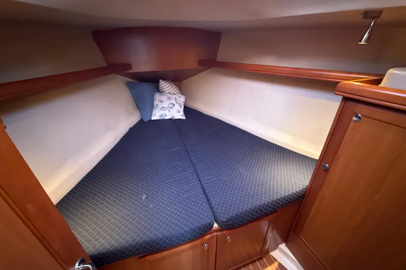 Murrelet Yacht Photos Pics Cabin of a 2009 Hunter 38 sailboat with cozy bed.