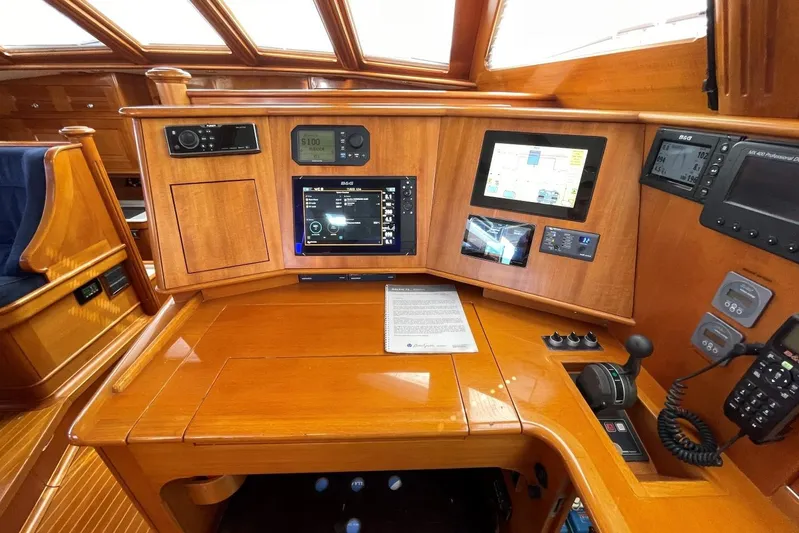  Yacht Photos Pics Control panel of a 1999 Baltic 73 Pilothouse yacht with navigation instruments.