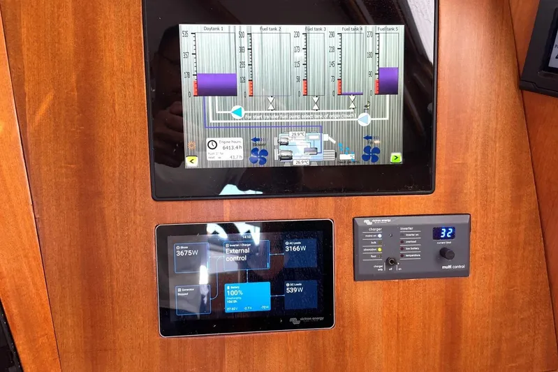  Yacht Photos Pics Control panel of a 1999 Baltic 73 Pilothouse yacht with digital displays.