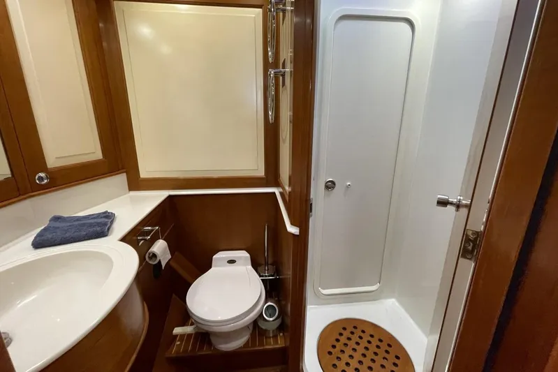  Yacht Photos Pics Bathroom interior of 1999 Baltic 73 Pilothouse yacht with shower and toilet.