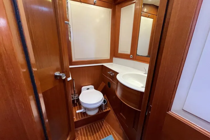  Yacht Photos Pics Luxurious wooden bathroom interior on 1999 Baltic 73 Pilothouse yacht.