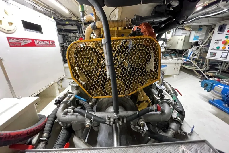  Yacht Photos Pics Engine room of 1999 Baltic 73 Pilothouse yacht with generator and machinery.