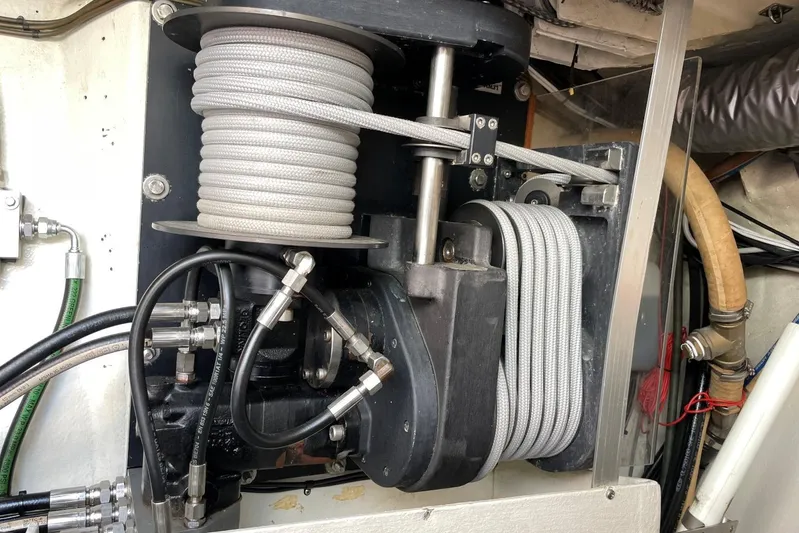  Yacht Photos Pics Hydraulic system in 1999 Baltic 73 Pilothouse yacht, featuring coiled ropes and connectors.