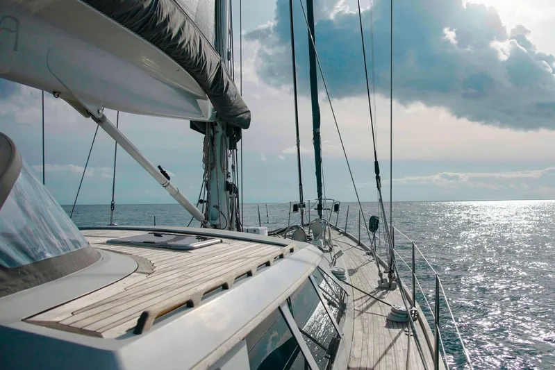  Yacht Photos Pics Sailing on Baltic 73 Pilothouse yacht, 1999 model, under cloudy skies.