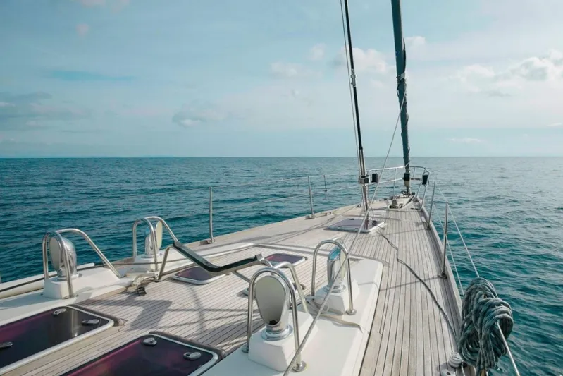  Yacht Photos Pics Deck view of 1999 Baltic 73 Pilothouse yacht sailing on open sea.