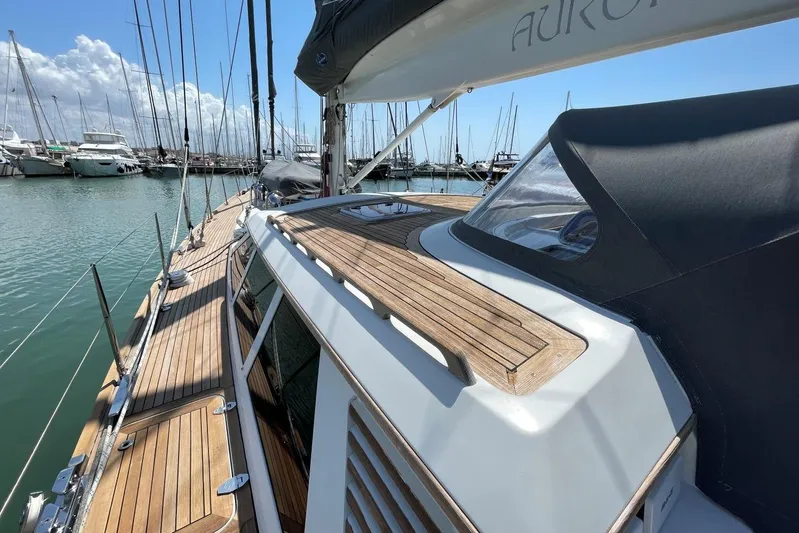  Yacht Photos Pics Baltic 73 Pilothouse yacht, 1999 model, docked in a marina with wooden deck.