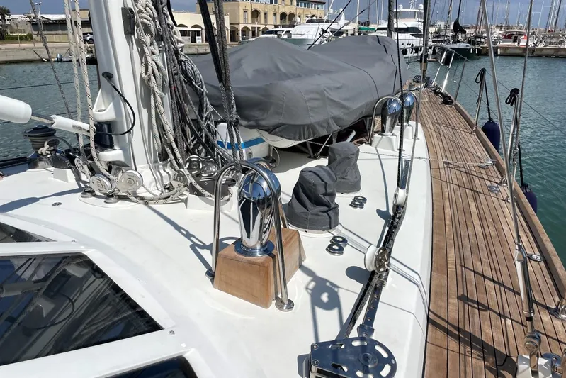  Yacht Photos Pics Deck of 1999 Baltic 73 Pilothouse yacht with rigging and covered equipment.