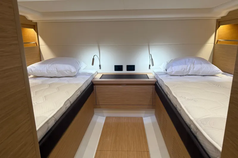 George Yacht Photos Pics 2024 Pardo Yachts 43 interior cabin with twin beds and modern wood finish.