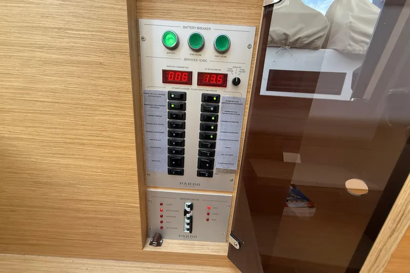 George Yacht Photos Pics Electrical control panel on 2024 Pardo Yachts 43, featuring switches and digital displays.