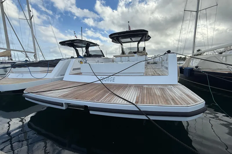 George Yacht Photos Pics 2024 Pardo Yachts 43 docked, showcasing sleek design and spacious deck.