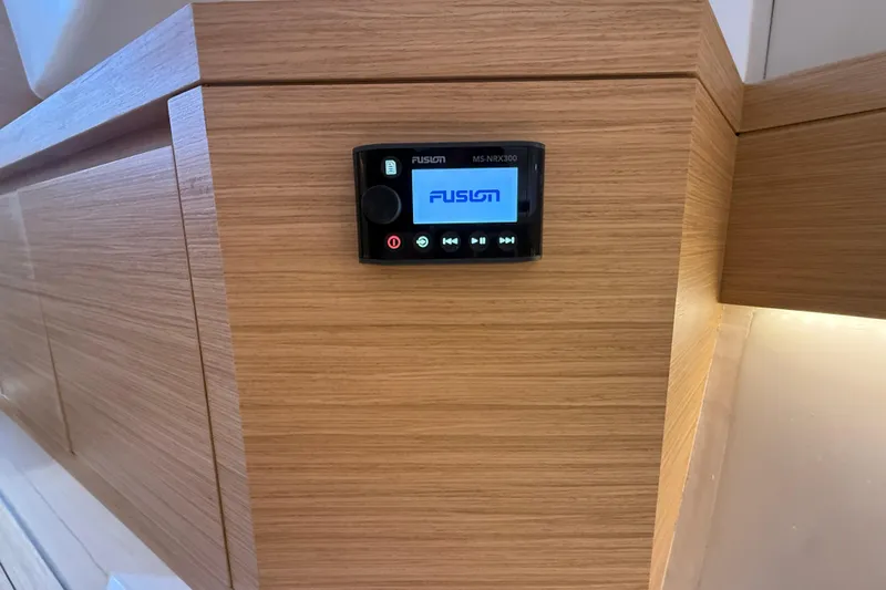 George Yacht Photos Pics Fusion audio system on 2024 Pardo Yachts 43, sleek wooden interior.