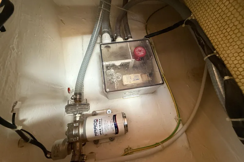 George Yacht Photos Pics Engine compartment of 2024 Pardo Yachts 43, featuring mechanical components and wiring.