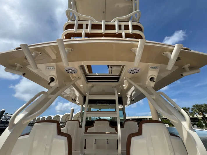  Yacht Photos Pics 2018 Scout 420 LXF boat interior with seating and overhead speakers.