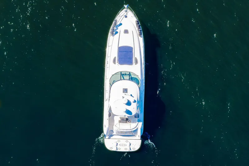 Nauti Lis Yacht Photos Pics Aerial view of 2005 Sea Ray 500 Sundancer yacht on open water.