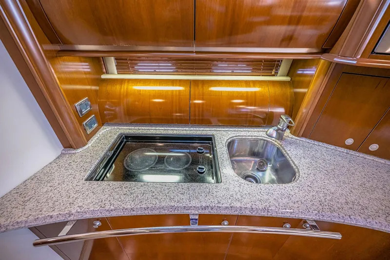Nauti Lis Yacht Photos Pics Luxurious 2005 Sea Ray 500 Sundancer yacht kitchen with granite countertop and modern appliances.