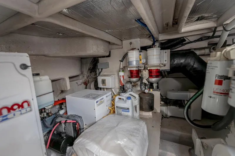 Nauti Lis Yacht Photos Pics Engine room of 2005 Sea Ray 500 Sundancer with filters and equipment.