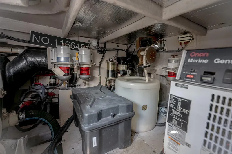 Nauti Lis Yacht Photos Pics Engine room of 2005 Sea Ray 500 Sundancer with Onan marine generator.