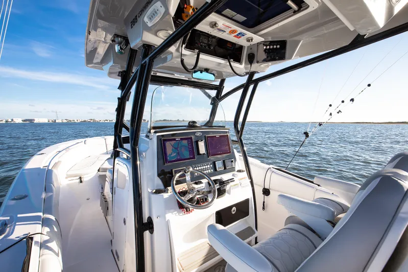 Fish Hunter Yacht Photos Pics 2021 Sea Fox 288 Commander boat interior with navigation system on open water.