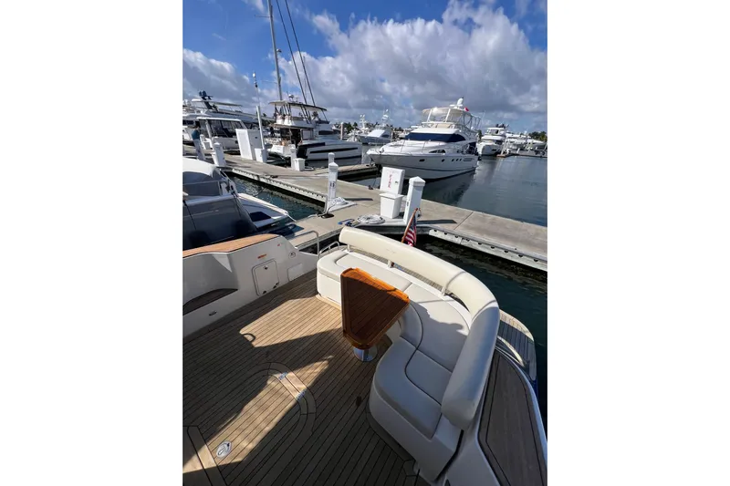 Split Decision Yacht Photos Pics 2007 Chris-Craft Roamer 40 yacht docked at marina, featuring elegant deck seating.