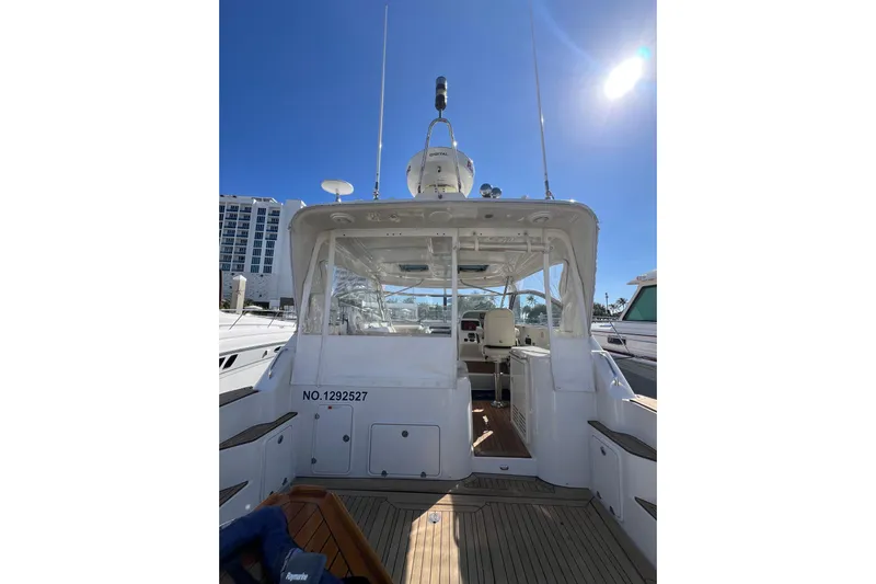 Split Decision Yacht Photos Pics 2007 Chris-Craft Roamer 40 yacht with open cockpit and clear blue sky.