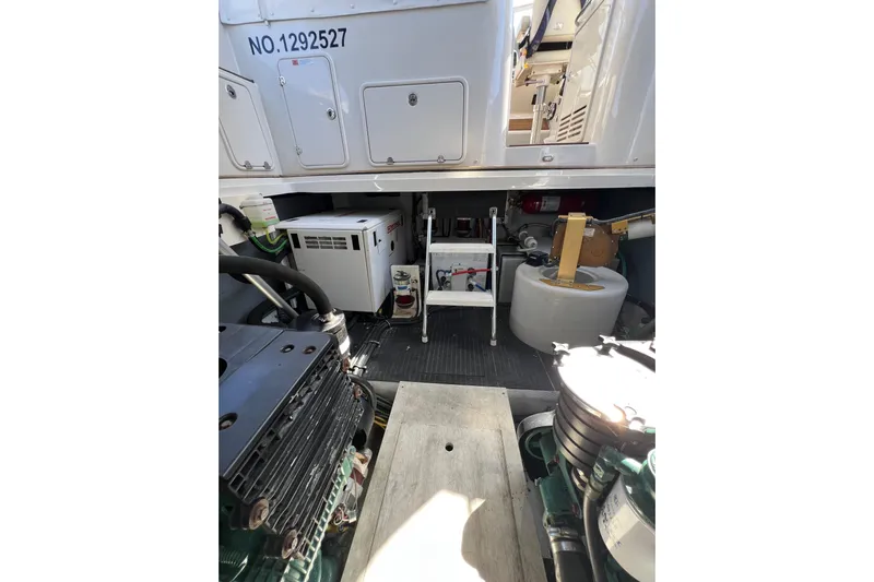 Split Decision Yacht Photos Pics Engine room of 2007 Chris-Craft Roamer 40 yacht, showcasing mechanical components and equipment.