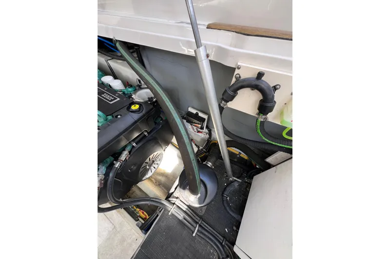 Split Decision Yacht Photos Pics Engine compartment of 2007 Chris-Craft Roamer 40 with visible components and wiring.