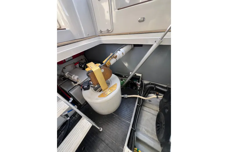 Split Decision Yacht Photos Pics Engine compartment of 2007 Chris-Craft Roamer 40 boat, showcasing mechanical components.