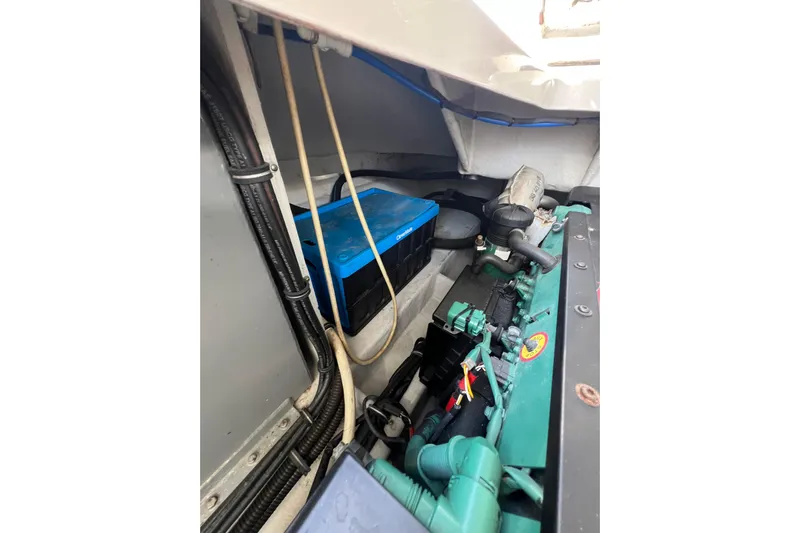 Split Decision Yacht Photos Pics Engine compartment of 2007 Chris-Craft Roamer 40 boat, showcasing mechanical components.