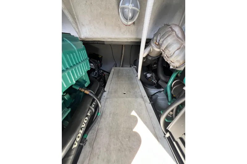 Split Decision Yacht Photos Pics Engine compartment of 2007 Chris-Craft Roamer 40 with Volvo Penta components.