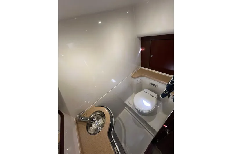 Split Decision Yacht Photos Pics Luxurious bathroom in 2007 Chris-Craft Roamer 40 yacht with modern fixtures.