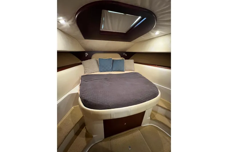 Split Decision Yacht Photos Pics Luxurious cabin interior of 2007 Chris-Craft Roamer 40 yacht with cozy bedding.