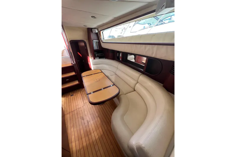 Split Decision Yacht Photos Pics Luxurious interior of 2007 Chris-Craft Roamer 40 yacht with elegant seating and wooden flooring.