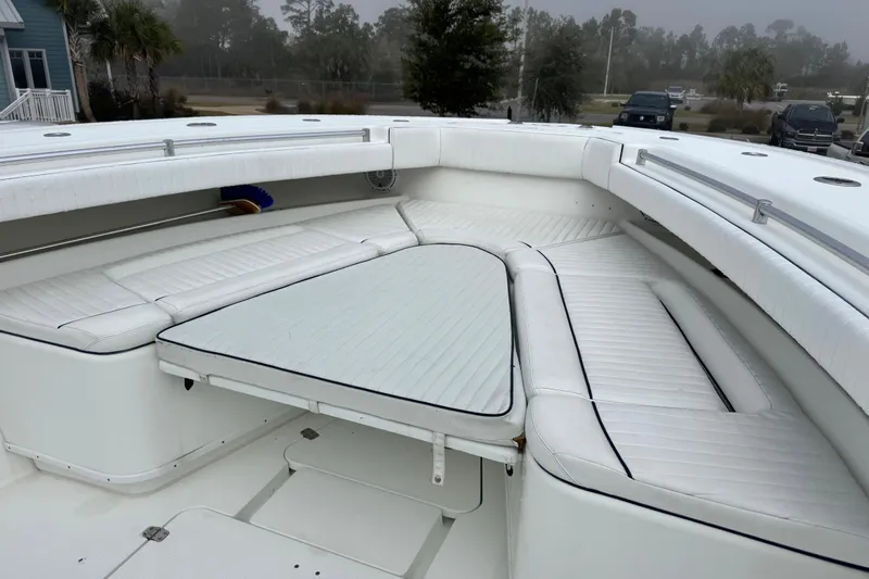  Yacht Photos Pics 2011 Yellowfin 42 Offshore boat with spacious white seating area.