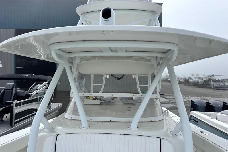  Yacht Photos Pics 2011 Yellowfin 42 Offshore boat with sturdy T-top and sleek design.