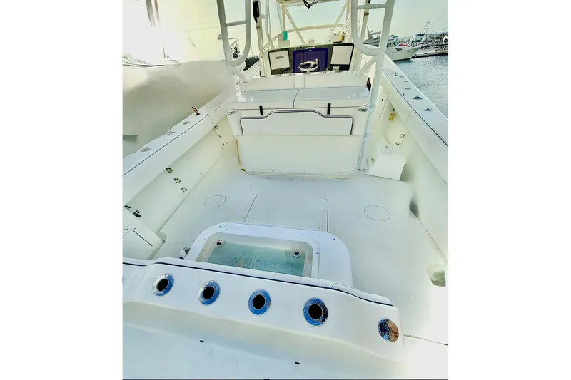  Yacht Photos Pics 2011 Yellowfin 42 Offshore boat interior with spacious deck and control panel.