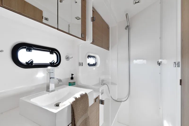 Chasing Shimmer Yacht Photos Pics Modern bathroom in 2018 Bali 4.0 yacht with sleek fixtures and natural light.