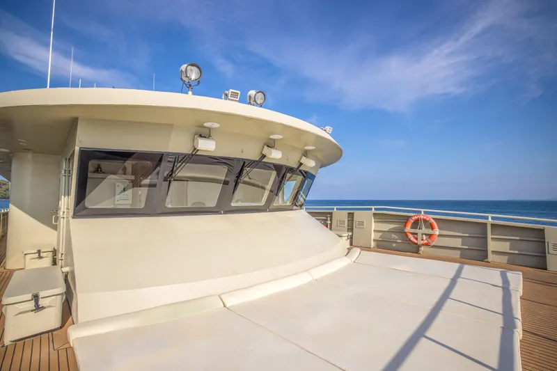 Vanora Yacht Photos Pics 2023 Seacrest Marine 52m Yacht deck with ocean view and clear sky.
